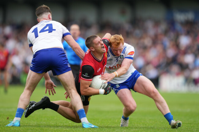 pat-havern-is-tackled-by-ryan-otoole-and-andrew-woods